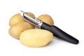 Potatoes and Peeler Royalty Free Stock Photo