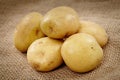 Potatoes on a rustic canvas Royalty Free Stock Photo