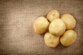 Potatoes on a rustic canvas Royalty Free Stock Photo