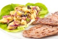 Potatoes salad with grilled meat