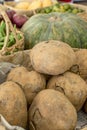 Potatoes,squash,green beans and other vegetables and fruits for sale at a small market stall Royalty Free Stock Photo