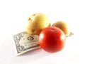 Potatoes, tomato and Dollars. Food and money. Harvest, sale, inc