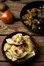 Potatoes vareniki in a ceramic bowl.