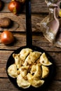 Potatoes vareniki in a ceramic bowl.