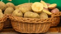 Potatoes in wicker basket Royalty Free Stock Photo