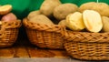 Potatoes in wicker basket Royalty Free Stock Photo