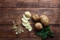 Potatoes on wooden background,sliced potatoes