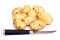 Potatos and knife Royalty Free Stock Photo