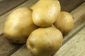 Potatos on wood place Royalty Free Stock Photo