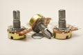 A potentiometer with fasteners. Variable resistor. A resistor with a rotator