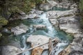 The Potholes of the Giants in the Toce River with green water and waterfall in Uriezzo