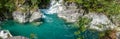 The Potholes of the Giants in the Toce River with green water and waterfall in Uriezzo