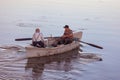 Poti, Georgia - 01.09.2019: A litte boat and the fishermen on the lake in Paliastomi. Poti