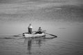 Poti, Georgia - 01.09.2019: A litte boat and the fishermen on the lake in Paliastomi. Poti