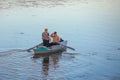 Poti, Georgia - 01.09.2019: A litte boat and the fishermen on the lake in Paliastomi. Poti