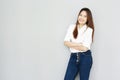 potrait Asian lady smile in casual suite White Shirt and blue jeans