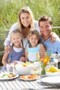 Potrait of family enjoying a meal outside Royalty Free Stock Photo