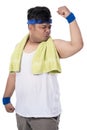 Potrait of fat young man with kiss pose to bicep with a towel