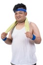 Potrait of fat young men sweat after exercising with towel