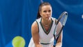 Potrait of Female Tennis Player Holding the Racquet During Championship Match, Ready to Receive Ball Royalty Free Stock Photo