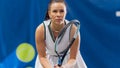 Potrait of Female Tennis Player Holding the Racquet During Championship Match, Ready to Receive Ball Royalty Free Stock Photo