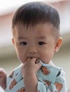 Potrait image of adorble and cute happy Asian Chinese baby boy