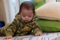 Cute Asian Baby boy with camouflage jacket Royalty Free Stock Photo