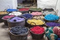 Pots with colorful yarns dyed in the old workshop Royalty Free Stock Photo