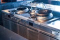 Pots and cooktops in restaurant commercial kitchens Royalty Free Stock Photo