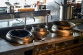 Pots and cooktops in restaurant commercial kitchens Royalty Free Stock Photo