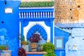 Pots of flowers on a city street, Chefchaouen, Morocco Royalty Free Stock Photo