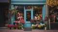 Pots with flowers on the street of old European town. Flower shop and flowers on the street of city on a sunny autumn Royalty Free Stock Photo
