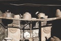 Pots and pans on rack in old rusty stove Royalty Free Stock Photo