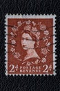 Potsdam, Germany - APR 26, 2022. A old of Great Britain United Kingdom issued stamp with portrait of Queen Elizabeth II with