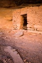 Potsherds on rock near entrance of pueblo dwelling