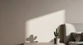 Potted cactus on bedside table with dramatic sunlight casting shadow on wall image Royalty Free Stock Photo