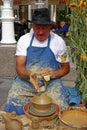 Potter making ceramic pot