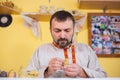 Potter making clay figure for board game Royalty Free Stock Photo