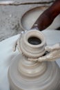 Potter making diyas clay lamps before diwali festival