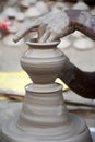 Potter making diyas clay pot before diwali festival