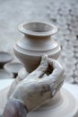 Potter making diyas clay pot before diwali festival