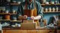 The potter packing ceramics. AI generated Royalty Free Stock Photo