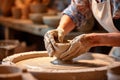 Close-up of a woman\'s hands in a ceramic workshop working with clay on a potter\'s wheel. Generative AI