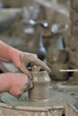 Potter's hands making a pot Royalty Free Stock Photo