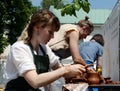 Potter shows a master-class of making pottery