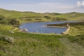 Potter Tarn lies east of Staveley