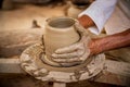 Potter at work makes ceramic dishes. India, Rajasthan Royalty Free Stock Photo