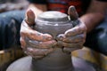 Man potter making ceramic pot on the pottery wheel Royalty Free Stock Photo