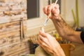 Potter working on potter`s wheel with raw clay with hands, making new bowl Royalty Free Stock Photo