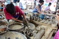 Potter working and Traveler study made earthenware at Koh Kret Island in Nonthaburi Thailand.